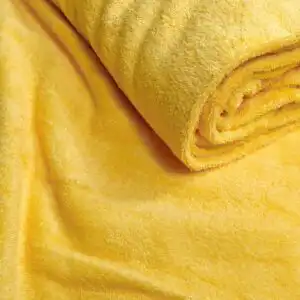 Päikesekollane froteekangas