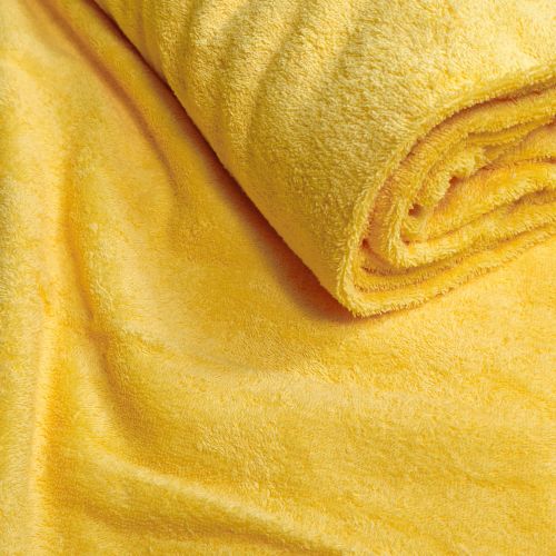 Päikesekollane froteekangas