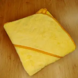 Päikesekollane kapuutsiga vannirätik