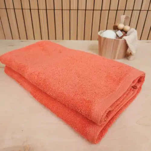 Korallroosa froteerätik 100 x 180 cm