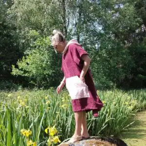 Tumepunane froteekangast täiskasvanute sauna pontšo